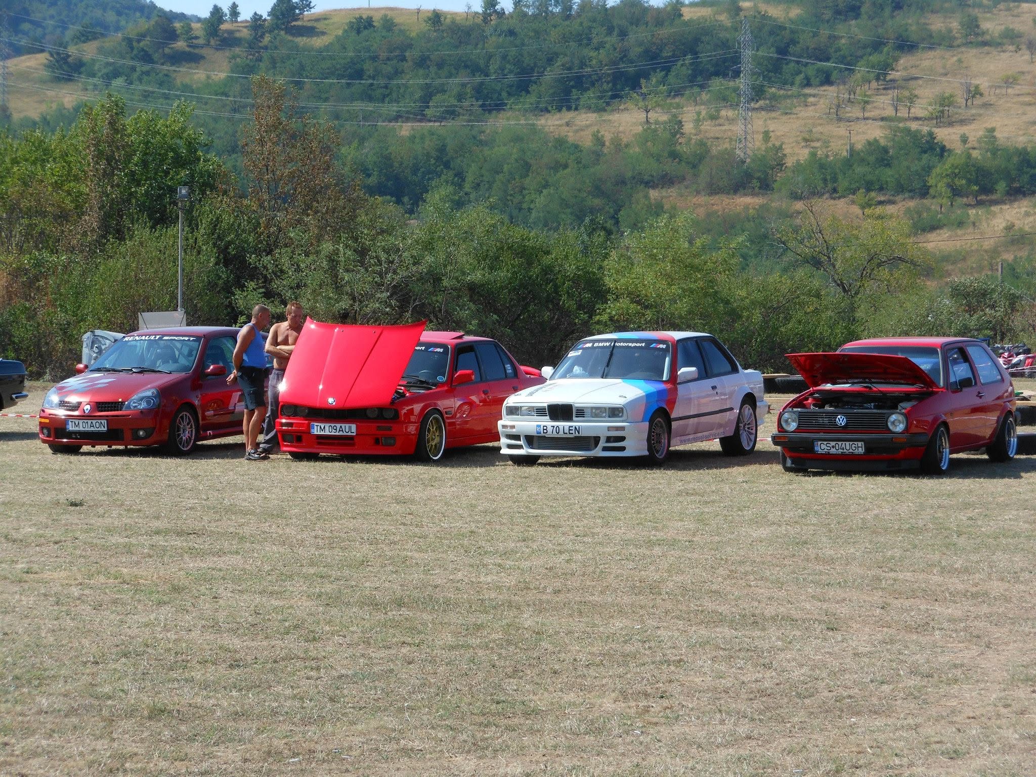 West Runners Motorsport line-up on wet tarmac at night in Timișoara